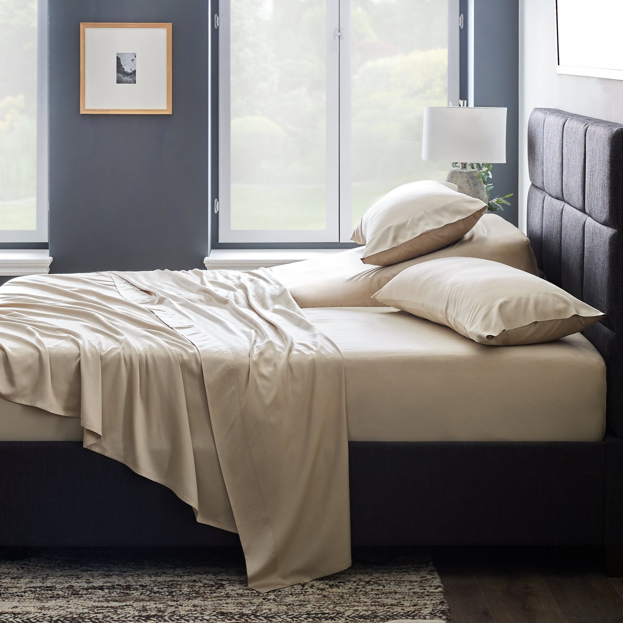 Side view of bed with driftwood sheets