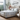 Woman making a bed with Bamboo Sheet Set. 'Special Offer' stamp in corner.